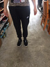 耐克（NIKE）运动裤女裤 25春季新款运动休闲裤健身训练针织宽松收脚长裤子 热推/经典黑色/晒图退5 M (160/66A) 实拍图