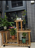 华观家居（Home Giving Furniture）多层实木花架阳台置物架室内花架子客厅落地式多肉绿萝花盆植物架 C款碳色带轮 实拍图
