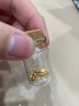 中国黄金（CHINA GOLD）黄金金豆AU9999豆子1g金豆豆储蓄节日礼物 元宝1g【礼盒礼袋+玻璃瓶+证书】 实拍图