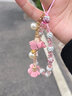 珍格手机挂绳水晶链珠子手工编织手机壳吊坠水钻女挂件短款手腕防丢钥匙u盘绳苹果op华为vi手机带挂饰 【清新粉】水晶花朵吊坠挂绳 实拍图