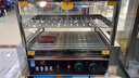 浙新金拓烤肠机商用小型摆摊烤香肠机台湾热狗机家用全自动控温【含七件大礼包】 10管丨 双控温丨无门丨有置物架 实拍图