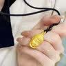中国黄金（CHINA GOLD）佛头黄金吊坠足金如来佛项链大日如来生日礼物情人节礼物送女友 大日如来佛头吊坠【黑绳】约8.3g 定制款2-3天 实拍图