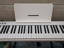 爱里森（ANYSEN）电子琴折叠琴88键初学者儿童成人家用专业版便携式键盘琴电子钢琴 标准款白色+琴架+大礼包 实拍图