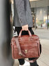吉旺（JIWANG）新款纯头层牛皮手提包商务公文包真皮男士包包单肩包斜挎包大容量 红棕色 实拍图