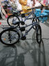 凤凰（Phoenix）山地车自行车成人男款女12岁到18岁青少年学生变速越野土坡车单车 钢架【全轴承/超省力】辐条轮黑蓝 24寸24速【身高138-168cm】 实拍图