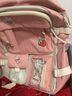 索亚特书包女中学生小学生大容量三到五六年级双肩包初中生女孩高中背包 粉色四件套+徽章+小熊挂件 实拍图