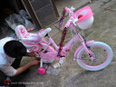 鑫旺彤自行车儿童3-6-10岁单车男女童轻便脚踏车辅助轮5岁女孩车公主车 粉升级折叠白胎【悍马轮+护栏】 16寸 适合身高105-125cm 实拍图