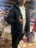 安踏（ANTA）面包羽绒服丨四防短款速暖羽绒服男冬季立领加厚保暖男装棉服外套 【樊振东同款】连帽四防科技logo-基础黑7901-1 4XL 实拍图