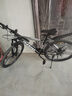 凤凰（Phoenix） 山地自行车成年人男士女士学生变速减震油刹线刹山地车自行车 黑白色十刀轮高碳钢车架 27.5寸（身高170-190左右） 24速数字指拨/默认线碟可改油碟 实拍图