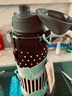 膳魔师（THERMOS）大容量儿童FHO不锈钢保温杯 双盖两用直饮带杯套可调节背带便携 黑蓝配色-蝴蝶结 1000ML 实拍图