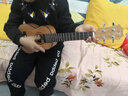TOM单板初学者尤克里里单板桃花心木乌克丽丽学生男女儿童ukulele 23英寸T5电箱，碳素弦 实拍图