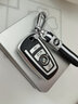 迪加伦 宝马钥匙包 新3系 5系 X1 X3 X4 X5 7系 6系GT刀锋汽车钥匙扣套壳改装男女 A款--金属漆皮纹极光银+黑白绳 宝马五系5系525LI 530LI 730 320 实拍图