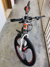 凤凰（Phoenix）山地自行车成人男女学生青少年减震变速越野公路通勤车山地车 26寸白红刀轮 30速数字指拨（前中后全轴承） 实拍图