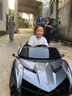 星辰皓兰博基尼儿童电动车汽车四轮带遥控玩具车可坐人男女宝宝双座童车 烤漆银MP4液晶屏+四驱+皮座+软胎 双人座位+剪刀门+蓝牙+音乐+摇摆 实拍图