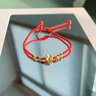 中国黄金（CHINA GOLD）玫瑰花黄金手链女足金编织红绳手串生日礼物送女朋友老婆 足金玫瑰花金线手绳+证书礼盒【纪念品】 实拍图