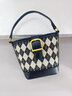 UR女包拼接女士包包2025新款菱格绣线单肩斜挎包小众高级手提水桶包 黑色 实拍图