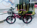优诗诺（YOUSHINUO）儿童自行车山地车男女孩单速变速辐条一体轮可选6-8-9-15岁学生车 变速黑粉+双碟刹一体轮+大礼包 20 寸适合125-145CM 实拍图