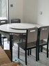上林春天 岩板餐桌 实木餐桌椅组合现代简约伸缩折叠圆桌吃饭桌子餐厅家具 雪山白-黑白框架【木椅】 1.35m 一桌四椅 实拍图