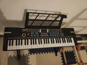 八度宝贝（Octavebaby）儿童电子琴61键智能亮灯跟弹初学者入门小钢琴多功能女孩教学乐器 亮灯跟弹-加大版王子黑+琴架 实拍图