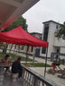 鑫鸿运【顺丰速发】遮阳棚雨棚户外遮阳伞大伞摆摊四脚伞帐篷简易伸缩棚 【2.5X2.5】黑架加固（红色） 实拍图