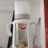 爱得利（evorie）玻璃奶瓶 宽口径带保护套带手柄奶瓶 婴儿奶瓶240ml (自带十字孔) 实拍图