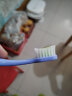 洋精灵 儿童牙刷换牙期6-9岁宝宝成长牙刷软毛清洁口腔护齿 蓝/紫 实拍图