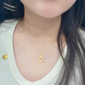 中国黄金（CHINA GOLD）蝴蝶结平安扣黄金项链女款在逃公主黄金吊坠情人节生日礼物送女友 平安扣蝴蝶结吊坠【配S925链】约0.3g 实拍图