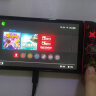 任天堂（Nintendo）Switch OLED/续航加强日版/港版便携家用ns体感游戏掌机 日版OLED红蓝+塞尔达王国之泪（加赠2年会员） 实拍图