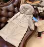慕奈纤高端品牌女装羽绒服女中长款新品过膝加厚白鸭绒大毛领外套女 香槟色(真狐狸大毛领) M(106-120斤左右) 实拍图