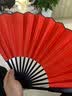 臻臻上品（zhenzhenshangpin）扇子折扇男古风竹子古典中国风礼品手工扇双面黑白纯色便携纸扇 10寸红色绢布扇 实拍图