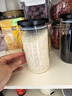 欣美雅（xinmieya）杂粮收纳盒玻璃瓶带盖储物罐食品密封罐咖啡豆储存罐茶叶罐便携收纳罐 深空黑1200ml*2+杯刷+标签 实拍图