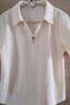 欧莎（OSA）纯色V形polo领t恤衫女士夏季衣服2025新款短袖高档显瘦减龄上衣 米白色 L 实拍图