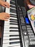 美科（Meirkergr）MK-2100智能版+琴架  亮灯跟弹61键钢琴键多功能智能电子琴乐器 连接话筒耳机U盘手机pad 实拍图
