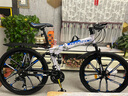 凤凰（Phoenix）折叠山地自行车男女成人学生青少年单车双减震碟刹轻便变速折叠车 白兰十刀轮/显档变速/三套全轴承 27速顶配-26寸（身高160-185CM） 实拍图