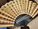 王星记扇子创意饰品中国风折扇古风杭州非遗丝绸绢扇10寸男士折叠扇礼盒 百脸谱 10寸 实拍图