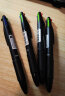 得力（deli） 四色合一圆珠笔0.7mm多色黑红蓝绿标记笔签字笔油性笔4色笔按动笔按压学生办公用 33390-4支装 实拍图