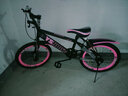 优诗诺（YOUSHINUO）儿童自行车山地车男女孩单速变速辐条一体轮可选6-8-9-15岁学生车 单速黑粉+小礼包 20 寸适合125-145CM 实拍图
