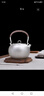 银器时代纯手工银壶烧水壶足银S999办公专用电陶炉送礼银茶具带滤网煮茶壶 中号环钮款420克 900ml 足银999+证书 实拍图