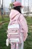 靓宝宝2026新款女生卡通书包女孩初中生5小学生6大容量四至六年级高颜值 小号粉色+徽章 实拍图