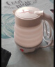 苏泊尔（SUPOR）电热水壶 SW-06J001 食品级硅胶 折叠双电压烧水壶 旅行便携电水壶 0.6L 贴心保温款 实拍图