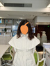 艾莱依羽绒服女2024气质长款风衣斗篷披肩通勤收腰大衣冬外套 乳灰米S 实拍图