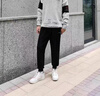 李宁运动裤男春秋冬季长裤子男士宽松舒适收口束脚裤休闲跑步针织卫裤 黑色 春秋季薄款 M /170 建议(120-130斤) 实拍图