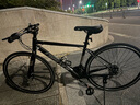 永久公路自行车700c前后碟刹男女式成人学生直把城市休闲通勤车 24速700C钢架线碟平把 幻影黑 实拍图