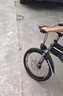 飞鸽儿童自行车6-10-15岁碟刹山地车男孩变速减震中学生女孩脚踏车 【单速】时尚银+减震碟刹+辐条轮 20寸适合身高130-150cm 实拍图