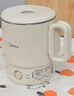 美的（Midea）第二代便携式可折叠烧水杯电热水壶 旅行出差学生 泡面杯小容量迷你一体无缝内胆 0.7升 SH07S104 实拍图