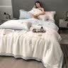 雅鹿水洗冰丝夏被四件套夏季双人家用夏凉被空调被单人宿舍夏天薄被子 贝琳达-奶昔白-风铃兰【裸睡】 床单款 四件套/1.5*2.0m夏被+床单+2枕套 实拍图