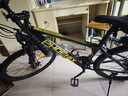凤凰（Phoenix）山地车自行车成年人男女学生铝合金禧玛诺变速减震油碟山地自行车 黑金/钢架/辐条轮/全轴承 21速进口禧玛诺/26寸 实拍图