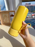 巧芬智能保温杯大容量男女儿童316不锈钢水杯便携高颜值学生随行杯子 316感应显温-柠檬黄400ml 实拍图