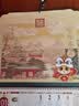 木雷 挂历2027年羊年家用挂墙式日历中国风金箔福字大号画新年月历新版老黄历手撕定制做公司企业广告 354-033金羊送福-【有布袋】42*76cm 实拍图