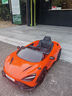携手迈凯伦儿童电动车四轮宝宝汽车可坐人男女小孩遥控玩具跑车儿童车 旗舰橙全功能+软轮+合金壳锂电瓶 实拍图
